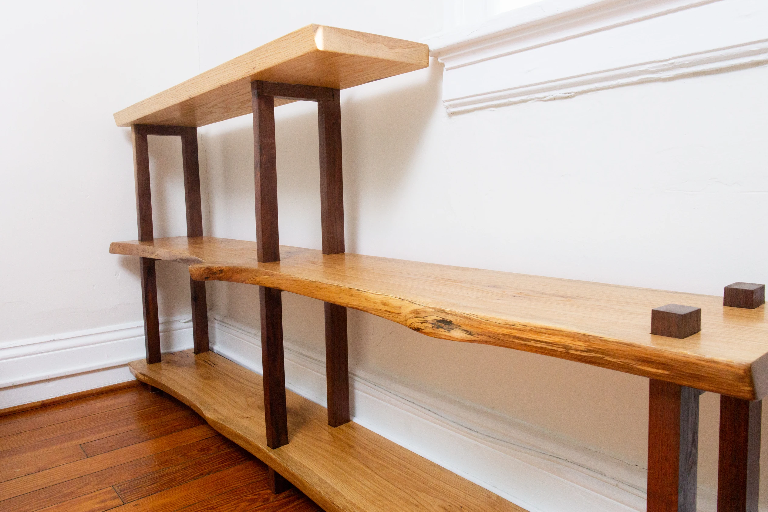 Walnut and live-edge white oak bookshelf