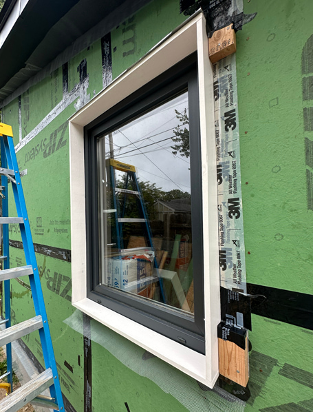Detailing the windows and bug screen for the exterior insulation.