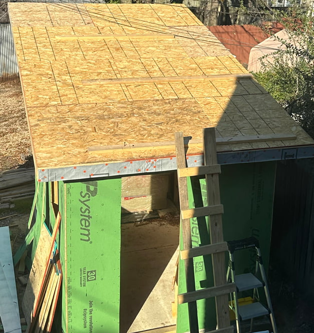 Installing roof sheathing part III.