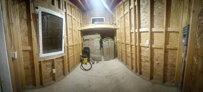 Shed with the light on at night