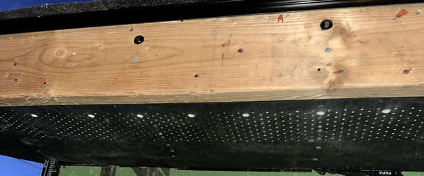 Installation of the vented soffit.