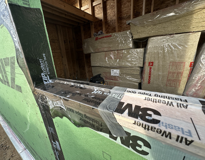 Flashing the sill with tape